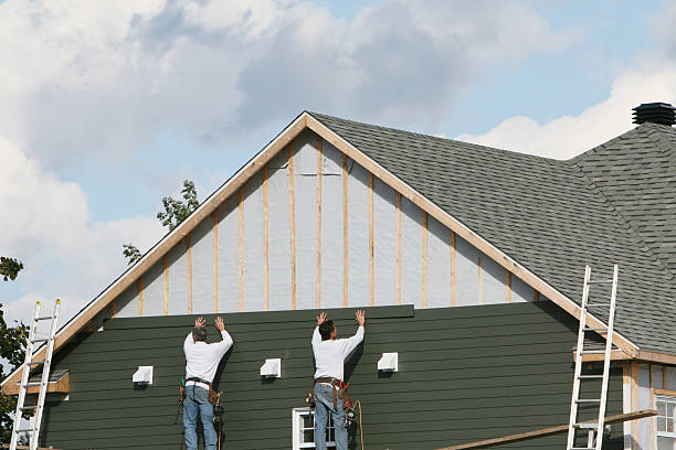 Professional Storm Damage Siding Repair technician working in New Straitsville, OH
